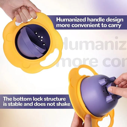 Yellow and purple baby bowl with handle held by hands, emphasizing design features.